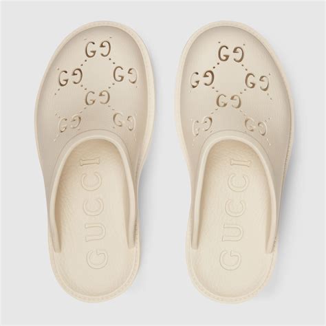 gucci perforated rubber sandals.